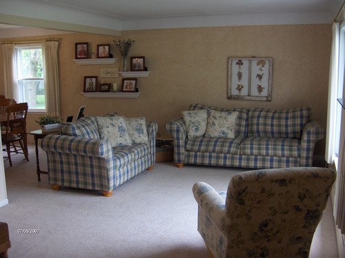 living room. wide open to front yard and to the dining area.  living room has a coved ceiling.