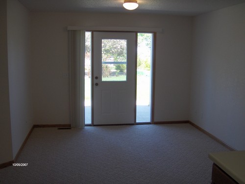 back door leads to backyard and patio