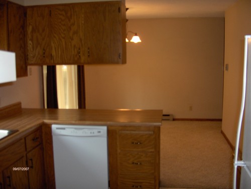 kitchen with eating bar and dining room